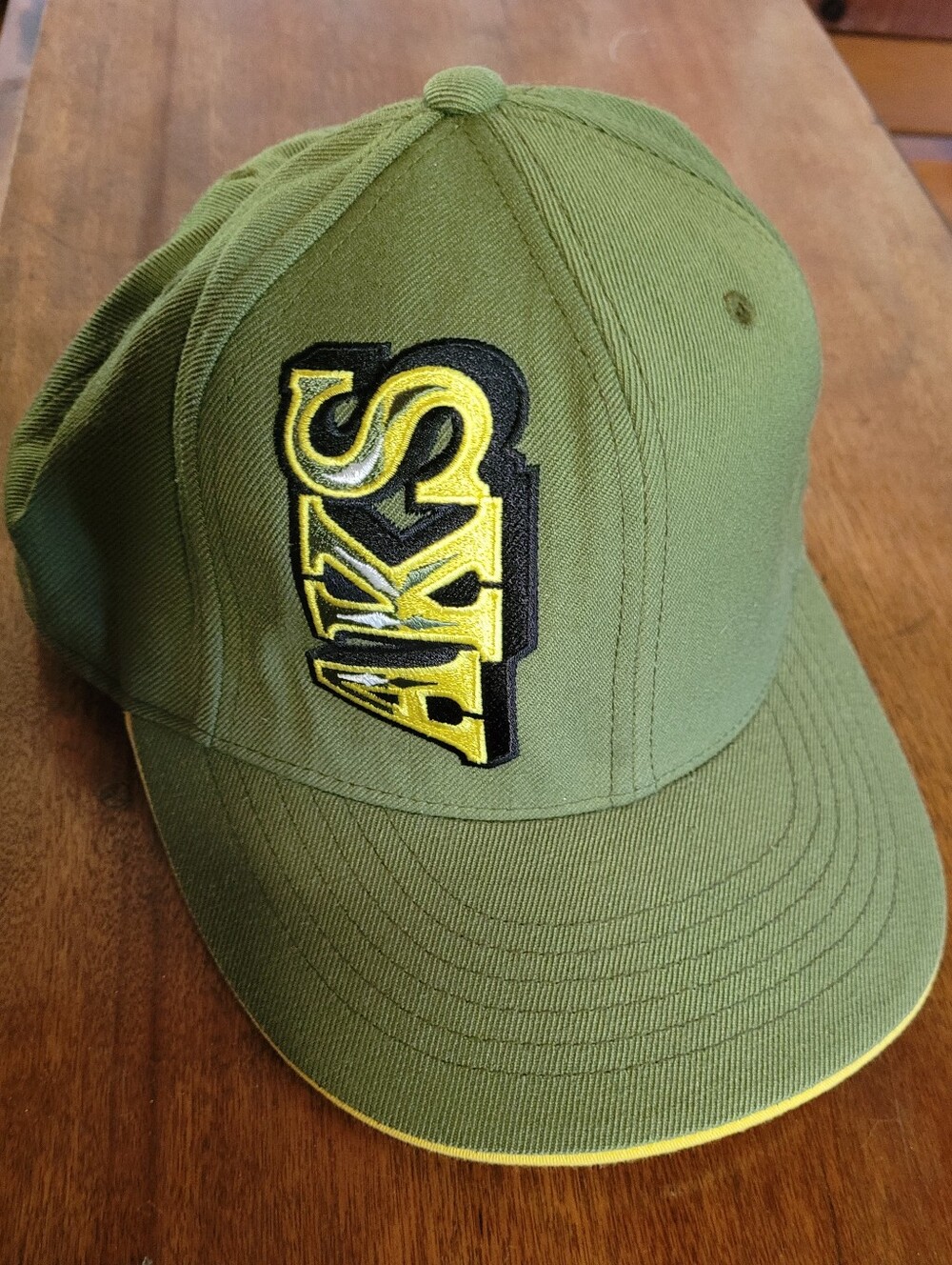 Akademiks Olive Green Cap with A Stylish Yellow Logo Patch (C02)